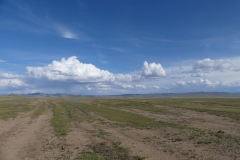 quelques cumulus sous une lègère couche de cirrus